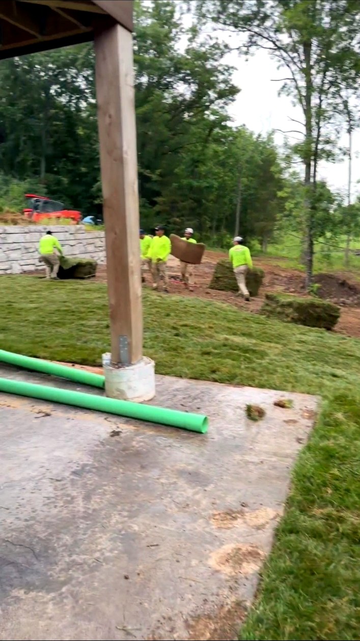 Cardinal Lawn Care crew installing fresh sod